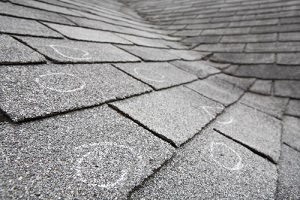 hail damage on shingle tiles